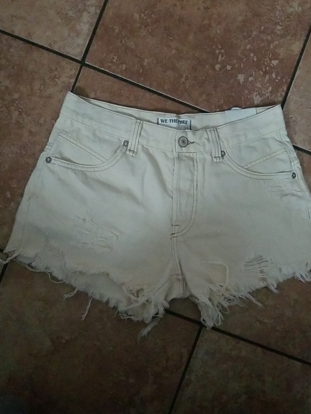 We The Free Cream Distressed Denim Cutoff Shorts